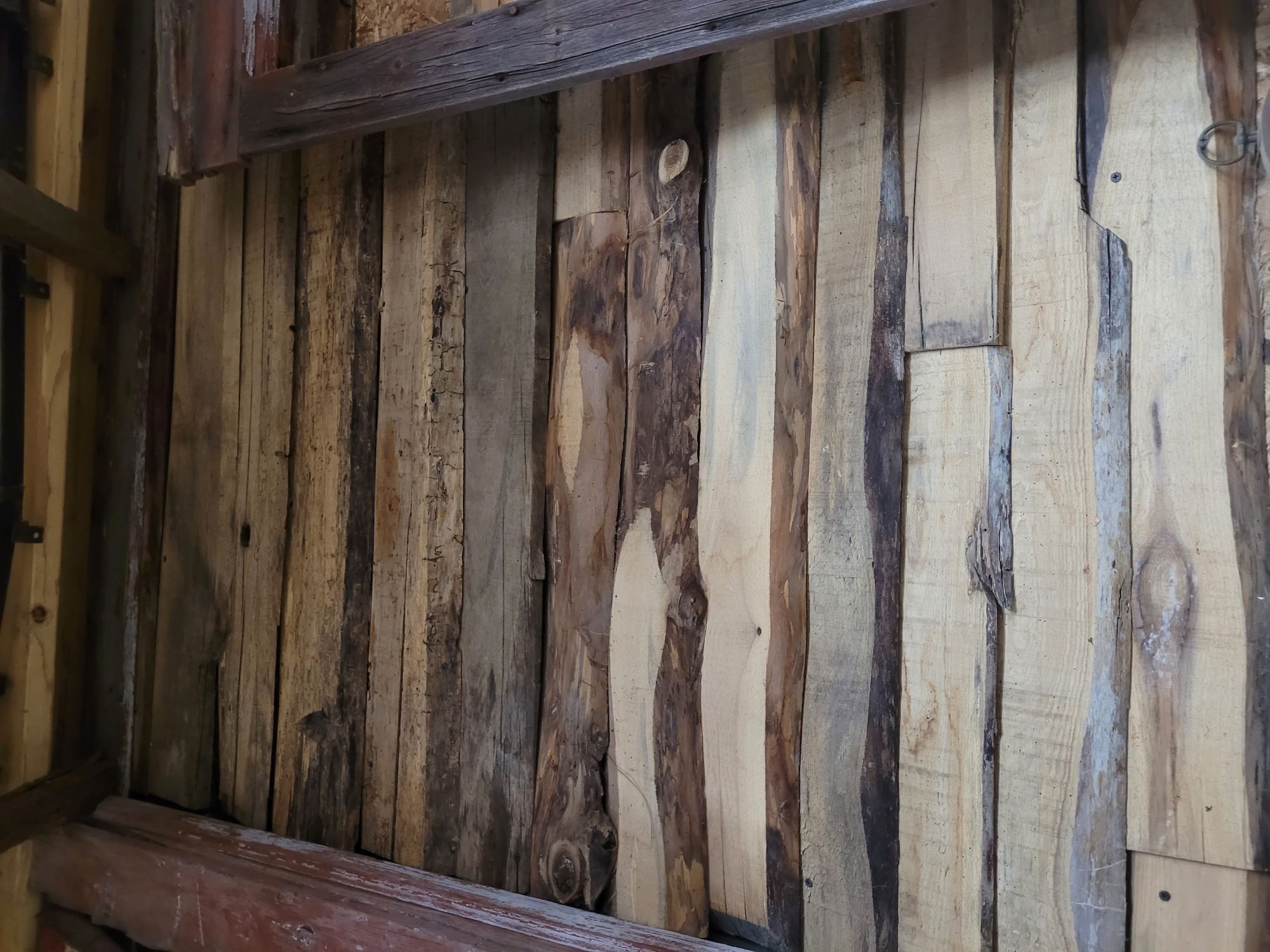 An accent wall installed in a customer's home using only live edge boards