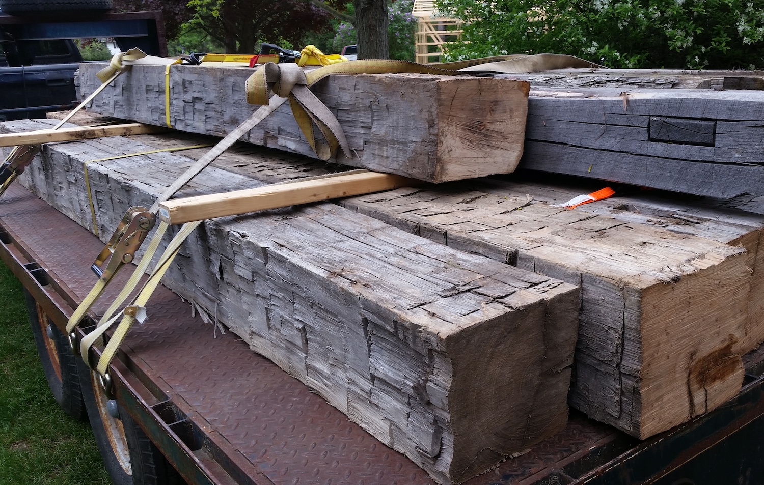 Reclaimed barn beams loaded onto a trailer