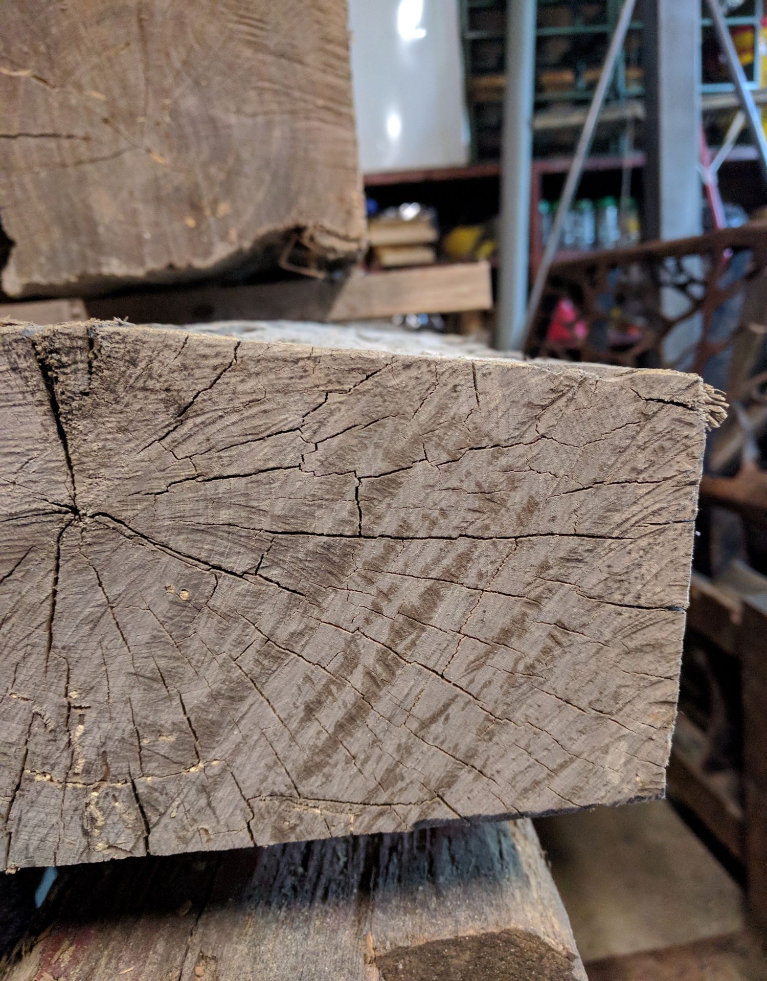 Close up of the corner of a reclaimed barnwood plank