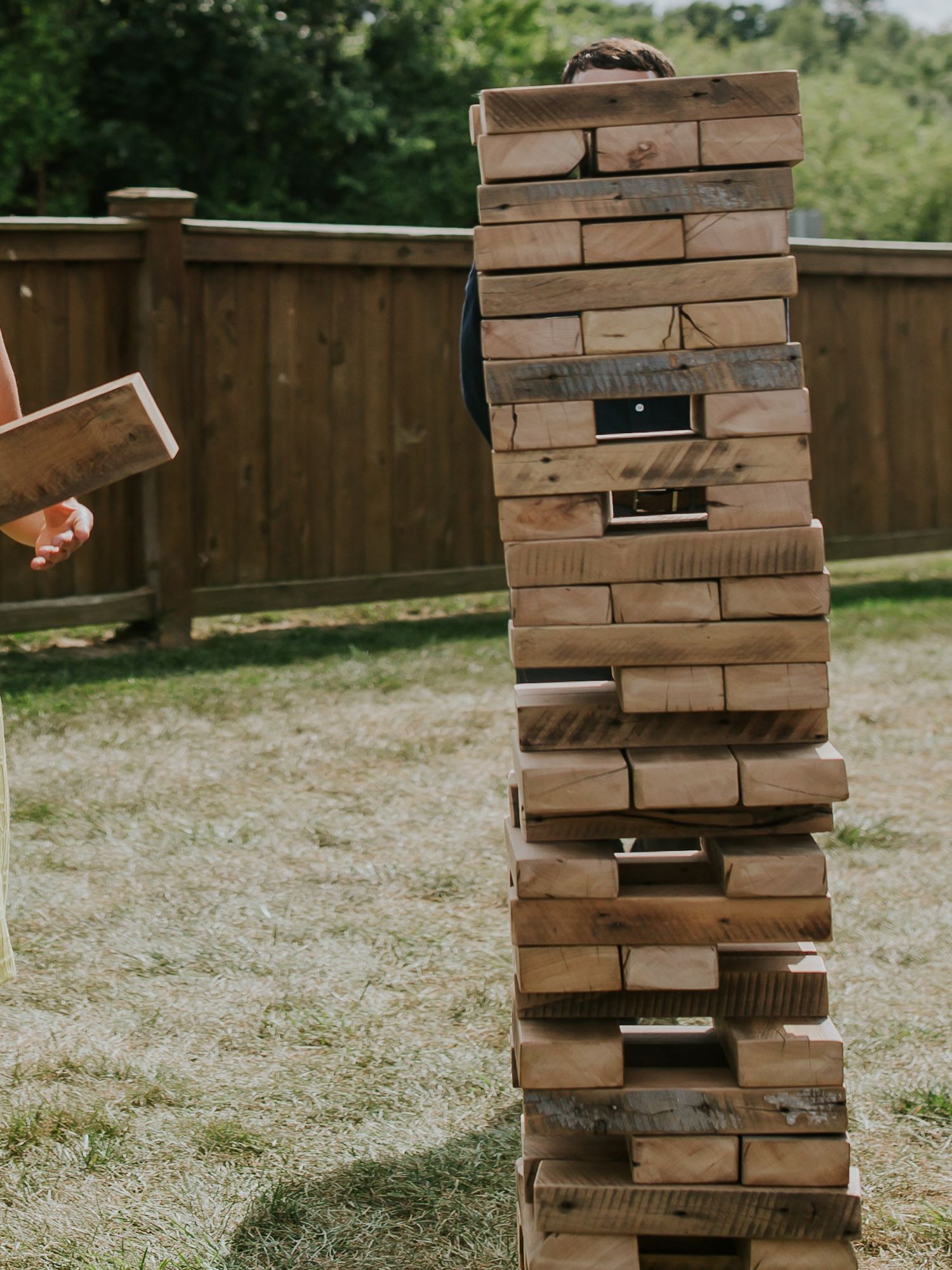 A handmade giant jenga set crafted using reclaimed barnwood