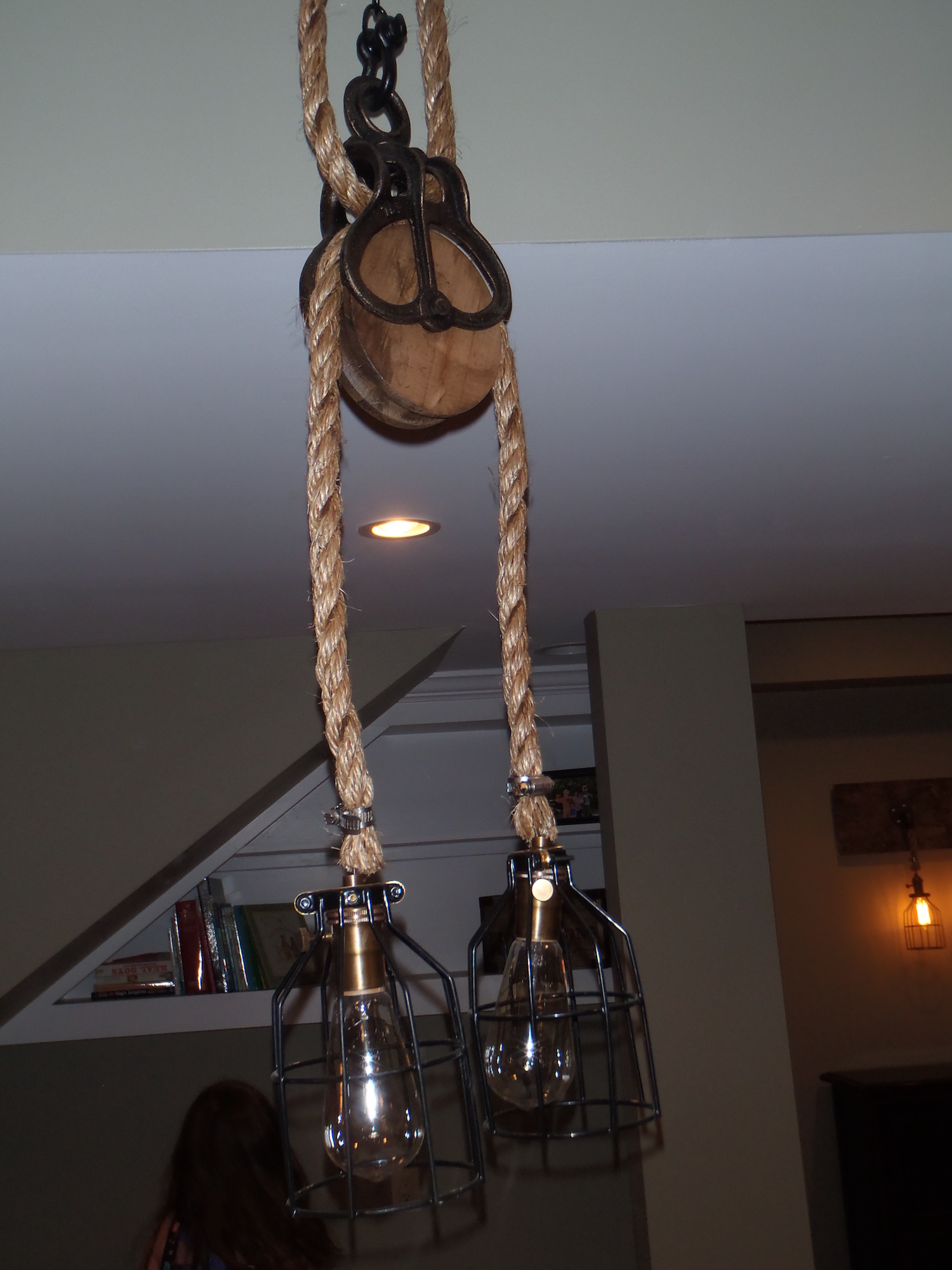 A custom light made by a Michigan Reclaimed Barns and Lumber customer