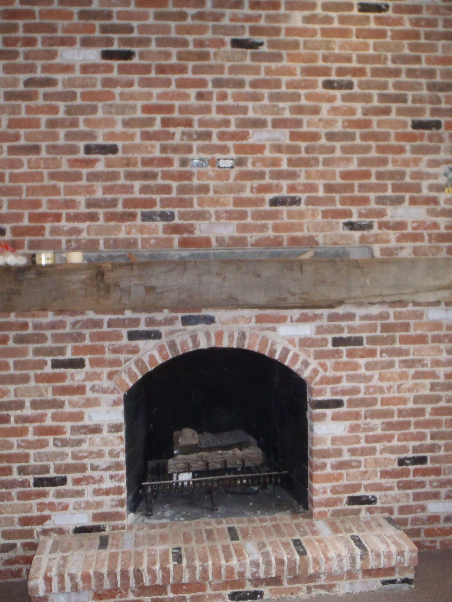 Reclaimed beam mantle from a 100 year old Michigan barn